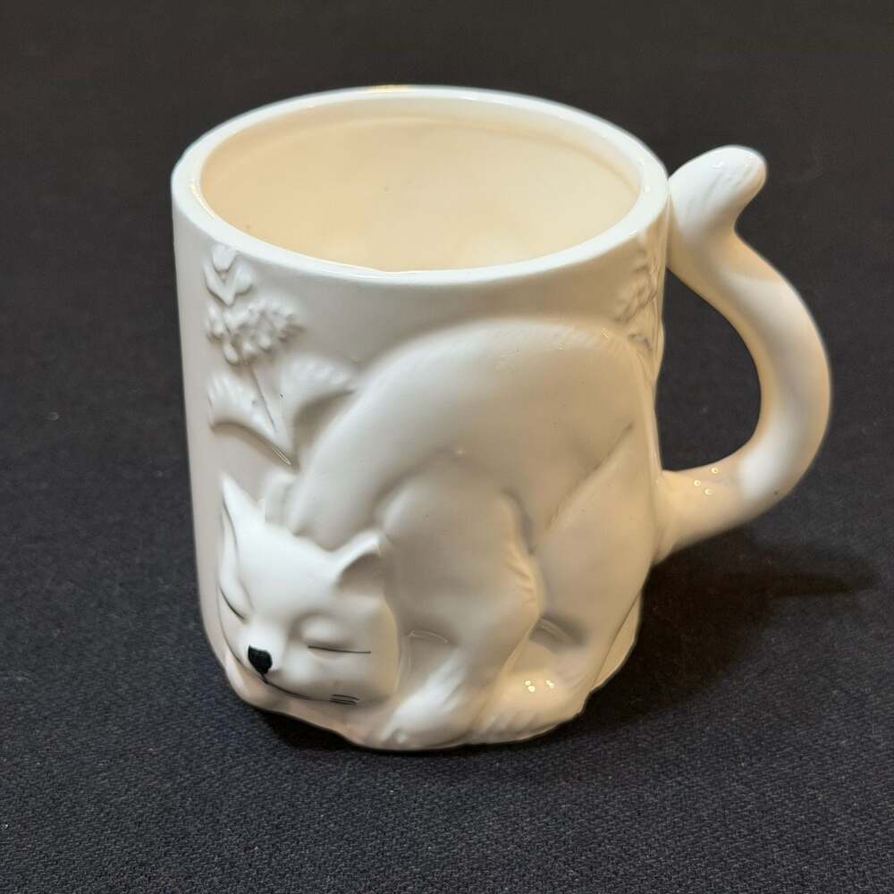 White Ceramic Embossed Cat Mug with Tail Handle